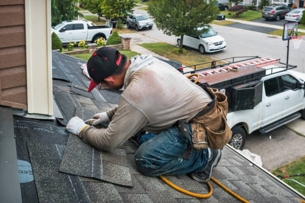 Professional Roofing technician working in Bellmore, NY